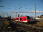 Der Hanseexpress aus Stralsund in Rostock, kurz vor der Einfahrt in den Hbf Rostock (in Hhe des BW Dalwitzhof)  13.12.09