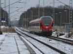 429 027 verlie,am 07.Februar 2013,als RE 13027 Stralsund-Binz die Station Teschenhagen.
