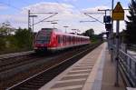 Als S7 nach Frankfurt Hbf kommt der 430 147 am Sonntagnachmittag in Dornheim an der Riedbahn eingefahren.