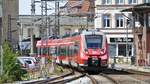 Der RE9 nach Sassnitz bei der Einfahrt in den Stralsunder Hbf.