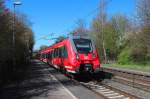 442 757 und 442 260 fahren am 15.04.2015 RE 10913 (Aachen Hbf - Siegen) durch Eilendorf.
