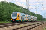 ET 445 100 der ODEG ohne veränderte  Folierung im Frontbereich am 23. Mai 2024 bei Diedersdorf in Richtung Berliner Hauptbahnhof als RE 8.