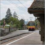 Der TRAVYS Be 4/8 003 (0948000 450 003-9 GT8-100D/2S) ist als Regionalzug nach Chavornay unterwegs und hat gerade den kleinen Halt St-Eloi verlassen, dessen Wartehäuschen recht im Bild angedeutet