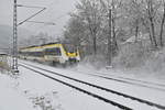 Auch der 8442 625 als RE10a nach Mannheim verdiente bei dem Schneetreiben einen Nachschuß seiner Durchfahrt in Neckargerach. 27.1.2021

