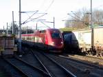 Zugbegegnung am Sonntag den 16.1.2011. Im Bahnhof Langerwehe durchfuhren der Thalys aus Paris und ein Gterzug der von 185 183-1 gezogen aus Kln kommend  die Gleisanlagen.