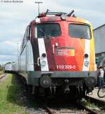 110 329-0 mit Science Express im Freiburger Gterbahnhof Nord 19.7.09