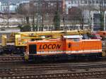Locon 211 rangiert vor Gleisbauschienenkran KRC 810T an der Gleisbaustelle am Aachener Westbahnhof. Dort wurden am 22.03.2009 2 neue Weichen in die Strecke nach Belgien eingebaut.