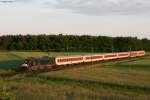 182 572 mit dem CNL 472 Basel-Kopenhagen im letzten Abendlicht bei Graben-Neudorf.