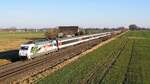 DB Fernverkehr 101 003  Design & Bahn  mit dem aus SBB-Wagen gebildeten EC 9 Hamburg-Harburg - Zürich HB (Marl, NI, 10.03.2022).