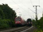 Hier die tgliche Zugbegegnung von EC 6 nach Hamburg-Altona links mit 101 049 und rechts EC 101 mit 101 108 nach Chur.3.8.09 