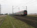 EN 408 von Karlsruhe Hbf mit Kurswagen aus Budapest nach Frankfurt(main)Hbf.Am 14.03.09 bei der durchfahrt in Lampertheim.