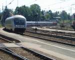 A IC from Frankfurt (Main) HBF to Salzburg HBF slows to stop at Traunstein station.