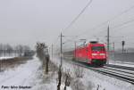 Zwischen all den nicht-alltglichen Sachen,was Normales: 101 012-3 mit IC 146 Berlin Ostbahnhof - Amsterdam Schiphol(Airport) im glnzenden Neulack,tobt durch Elstal (20.01.10)