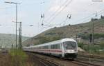 EC 115 (Mnster(Westf)Hbf-Klagenfurt Hbf) mit Schublok 101 035-4 bei der Durchfahrt  Esslingen (Neckar) 17.4.11