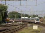 Eloc 1733 met een stam IC-rijtuigen waaronder een Bpmbdzf(!) als trein 147 naar Hannover Hbf te Hengelo - 13 juni 2006  Eloc 1733 mit IC-Wagen und ein Bpmbdzf(!) in Zug 147 nach Hannover Hbf in