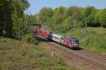 Deutlich vor Plan zeigte sich am 20.4.2014 der PbZ 2476 mit einem IC-, 2 Doppelstockwagen und 4 Loks der BR 111 vor Essen-Kray.