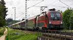 Die Taurus ÖBB 1116 218 kurz vor der Durchfahrt in Traunstein am 28.05.2022.