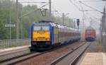 Am 28.05.13 überholte 146 520 mit dem Interconnex von Leipzig nach Warnemünde in Burgkemnitz die RB nach Wittenberg.