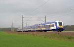 Am 19.04.14 durcheilt der Interconnex von Leipzig nach Warnemünde auf dem Gegengleis Burgkemnitz um die ihm vorrausfahrende RB zu überholen.