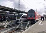 Nochmals Rostock Hbf. Hier ist der Zug neben einem RE von DB Regio zu sehen.
