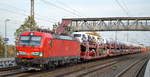 DB Cargo AG [D] mit  193 384  [NVR-Nummer: 91 80 6193 384-5 D-DB] Und PKW-Transportzug am 22.10.19 Durchfahrt Bf. Saarmund.
