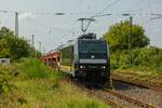 185 565-9 BEACON/EX MRCE mit Autotransportzug in Ostbevern, August 2024.