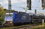 Crossrail Benelux N.V., Antwerpen-Borgerhout [B] mit der Railpool Lok  186 268-9  [NVR-Nummer: 91 80 6186 268-9 D-Rpool] und einem PKW-Transportzug am 17.10.24 Höhe Bahnhof Magdeburg Neustadt.