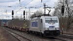 METRANS Rail s.r.o., Praha [CZ]mit ihrer  386 006-1  [NVR-Nummer: 91 54 7386 006-1 CZ-MT] und einem schwach ausgelastetem Containerzug am 11.03.24 Höhe Bahnhof Saarmund.