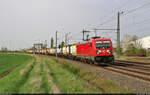 187 176-3 transportiert Kessel-Container Richtung Halle (Saale) und wurde in Niemberg abgelichtet.

🧰 DB Cargo
🕓 8.4.2024 | 17:15 Uhr