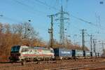 193 540 SBB Cargo International  Atomium Brüssel  mit Containerzug in Köln Gremberg, Februar 2025.