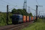 1142.635-0 der SVG mit einem Containerzug bei der Durchfahrt durch Hannover-Ahlten am 5.06.10