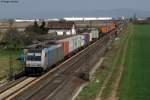 Railpool 185 716-8 mit einem Containerzug Richtung Sden. Ladenburg, 24.03.2012.