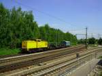 An der Nordöstlichen Ausfahrt des Karlsruher Güterbahnhof war am 25.04.2014 dieses interressante Gespann aus 203 316, einem Schwerlasttragwagen und einem alten türkisenem