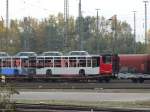 Ein Flachwagen mit Mercedes Benz Citaro Grundgerüst am 25.10.15 in Mannheim Rbf vom Bahnsteig aus fotografiert