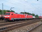 152 166-5 mit Taurus im Schlepptau bei Ausfahrt auf die Nrnberger Ringbahn Richtung Westen. (16.07.2005)