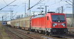 DB Cargo AG [D] mit  187 144  [NVR-Nummer: 91 80 6187 144-1 D-DB] und gemischtem Güterzug am 18.01.20 Bf. Flughafen Berlin Schönefeld.