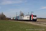 185 664-0 (Kombiverkehr) und 185 674-9 mit einem Güterzug in Ostermünchen, 27. März 2014 