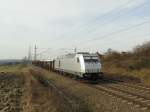 Die 76 111 am mit Schrott belandenen Güterzug bei Schönberg/Plauen am 17.03.2015.