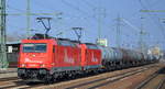 RHC Doppeltraktion 185 588-1 + 185 585-7 mit Kesselwagenzug am 25.03.18 Bf. Flughafen Berlin-Schönefeld.