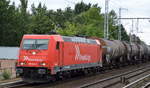  RheinCargo GmbH & Co. KG  185 604-6/2062  [NVR-Number: 91 80 6185 604-6 D-RHC] und Kesselwagenzug (leer) Richtung Stendel am 31.02.18 Berlin-Buch.