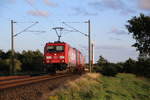 Am 5.8.17 fuhr 185 324-8 ihre erste Runde mit der Neuen  Werbung  für Kombi Verkehr und Spedition Bode.
Fotografiert in Eggebeeck bei Jübek.