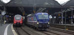 193 793-7 von Rurtalbahn-Cargo  kommt mit einem KLV-Containerzug aus Frankfurt-Höchstadt am Main(D) nach Genk-Goederen(B)und kommt aus Richtung  Köln und fährt durch den Aachener-Hbf in Richtung Aachen-Schanz,Aachen-West. 
Aufgenommen vom Bahnsteig 2 vom Aachen-Hbf.
Am Nachmittag vom 12.1.2020.