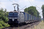Rpool 193 825-7 in Diensten von VTG auf der Hamm-Osterfelder Strecke am BÜ KM37,285 am 15.6.2023