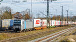 91 80 6193 803 mit einem KLV-Zug im Güterteil des Bahnhofs München Trudering am 24.11.2024.