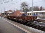 Niederbordwagen Kls am 26.November 2010 auf dem gesperrten Hauptgleis in Bergen/Rgen.