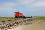 20.07.2013: FAUR 399 105-6 erreicht mit einigen Flachwagen in Krze den Westanleger.
