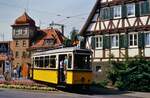 Am 26.09.1986 war es in Gerlingen ziemlich warm, so dass eine Fahrt mit TW 851 und Beiwagen 1390 ein echtes Vergnügen darstellte. Der Zug der Sonderfahrt überquert gleich die Straße neben der Feuerwache.