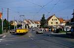 Der Sonderzug mit TW 851 und Beiwagen 1390 fährt gleich in die Gerlinger Straßenbahnschleife ein. Rechts neben der Straße ist das Gerlinger Straßenbahnmuseum gelegen. Es war zuvor Wagenschuppen der SSB. 
Datum: 26.09.1986 