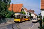 Der Sonderfahrtzug mit TW 802 (Serie T2) und Beiwagen ( Schiffchen  genannt) durchfährt die Gerlinger Straßenbahnschleife und nähert sich hier schon der Gerlinger Feuerwache.
Datum: 26.09.1986