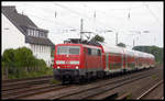 111113-7 ist hier am 9.8.2005 mit einem Dosto aus Minden kommend bei Schweicheln in Richtung Bielefeld unterwegs. 